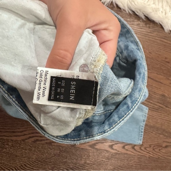 Light Wash Distressed Straight Leg Jean - Picture 3 of 5